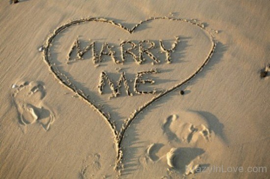 Marry Me Proposal On Sand